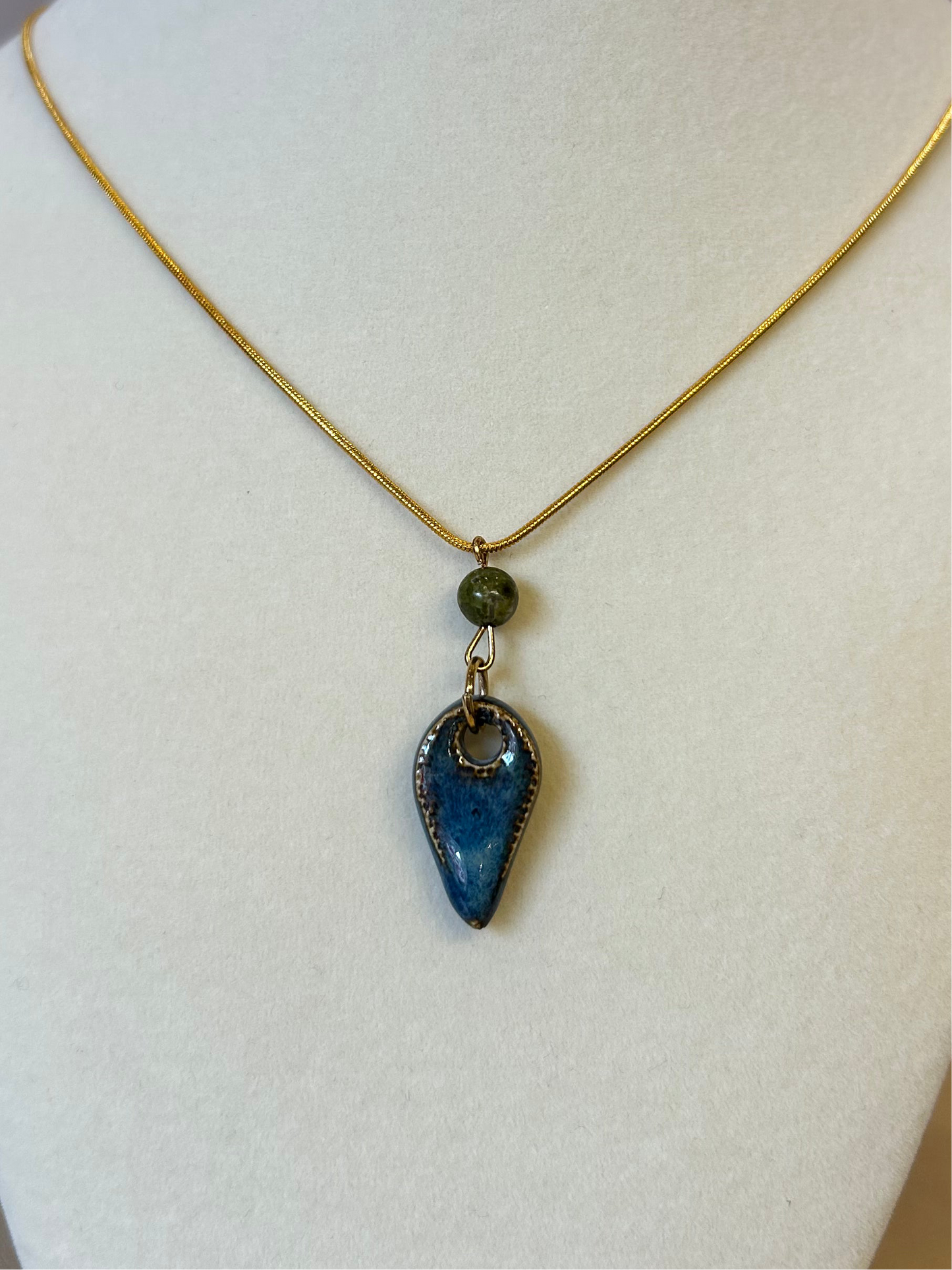 Green Bead Tooth Pendant