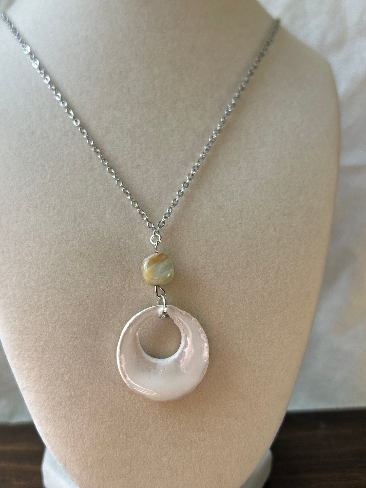 White stone pendant