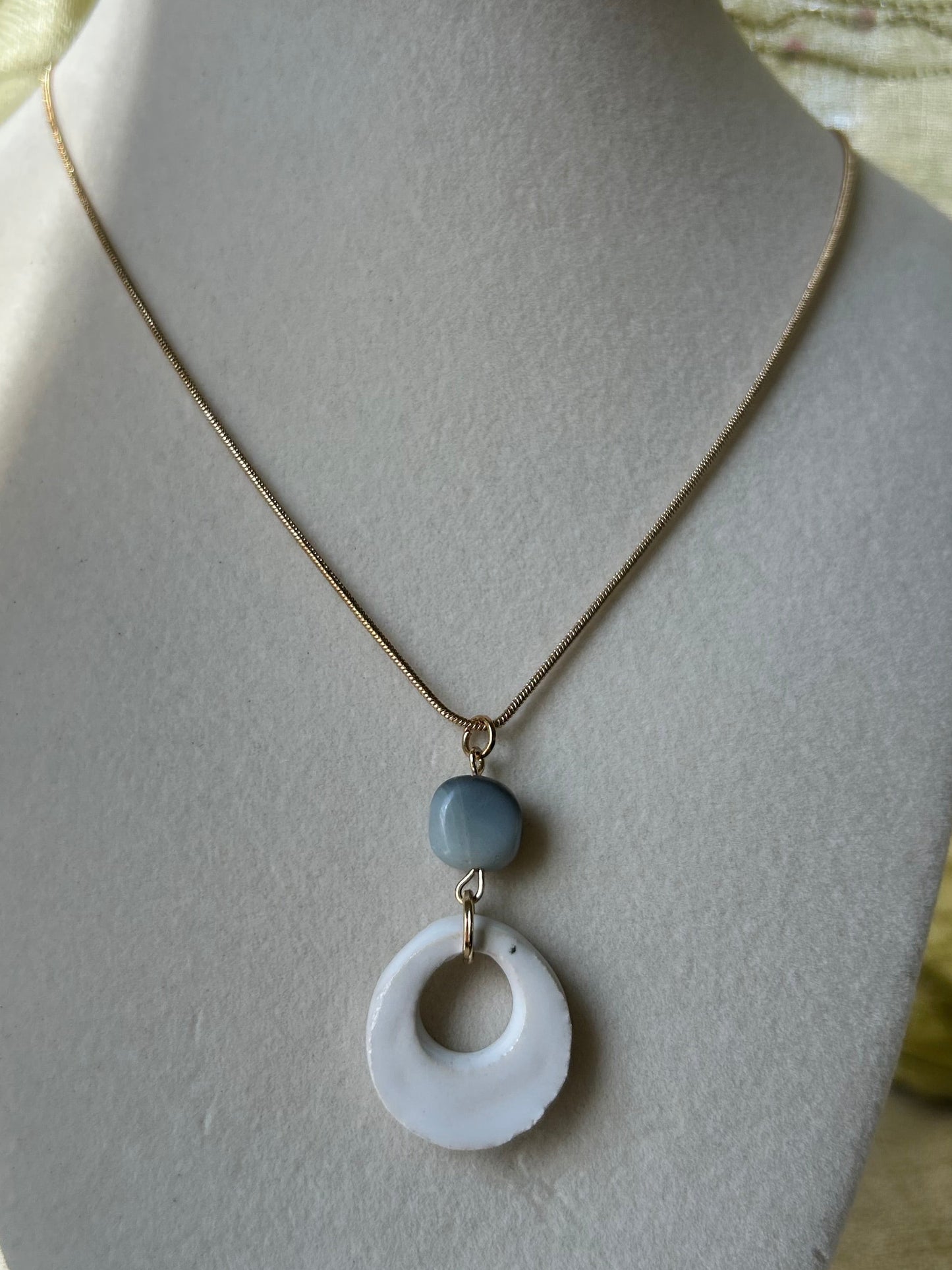 White stone pendant