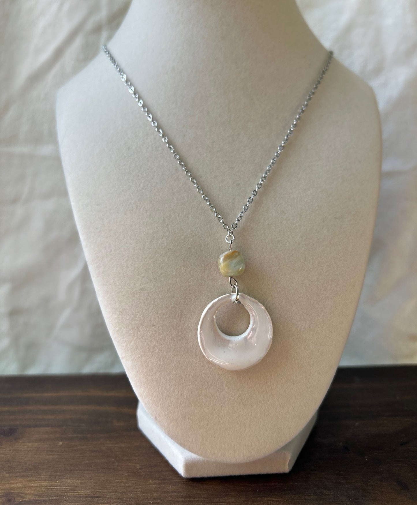 White stone pendant