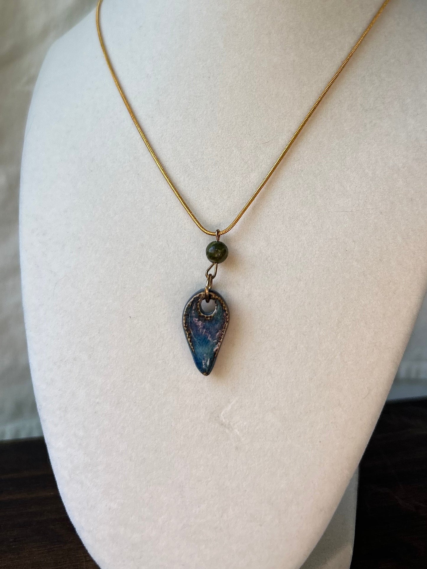 Green Bead Tooth Pendant