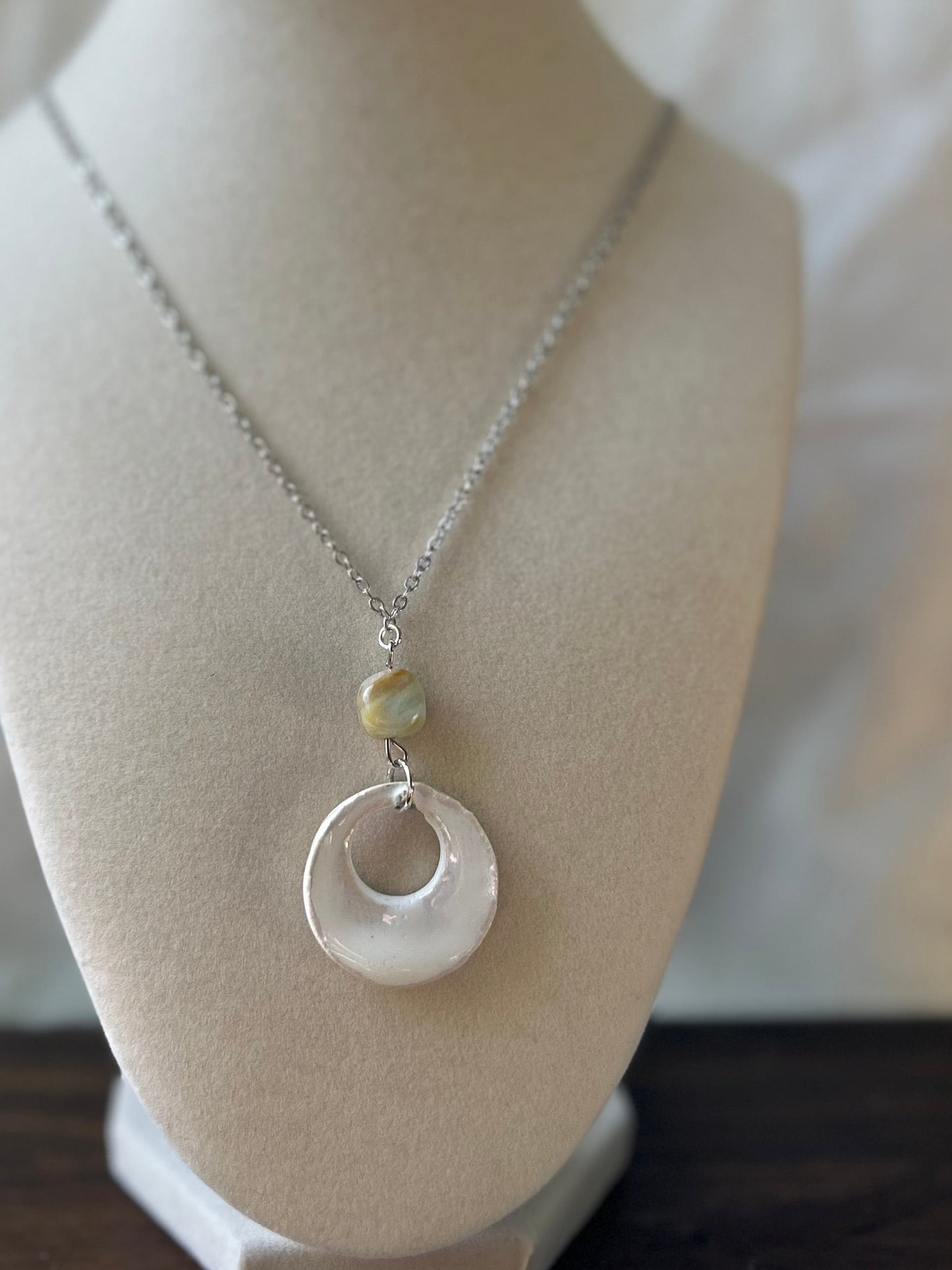 White stone pendant